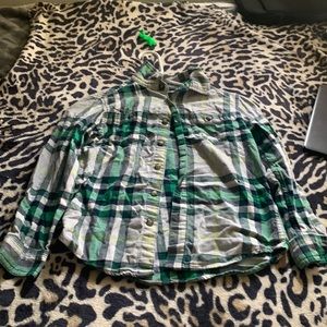 Green,white,grey, and black button up shirt
